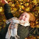 Girl lying on leaves