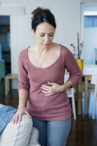 Woman suffering gas problem