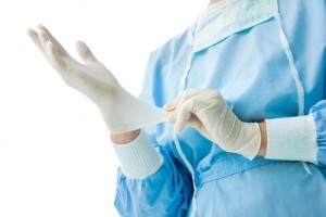 A doctor wearing gloves