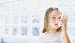 A girl inhaling air from pump