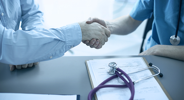 Doctor and Patient shaking hands